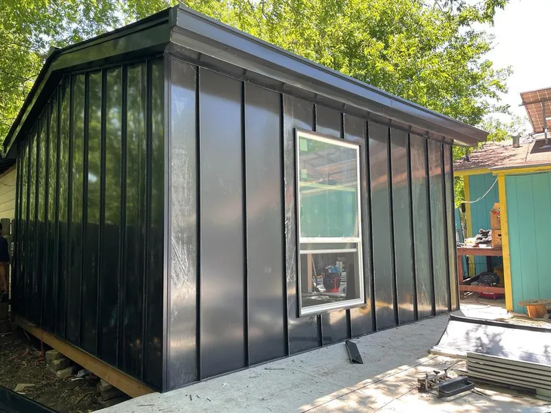 Black standing seam metal wall panels for Metal Roof Installation in Pikeville